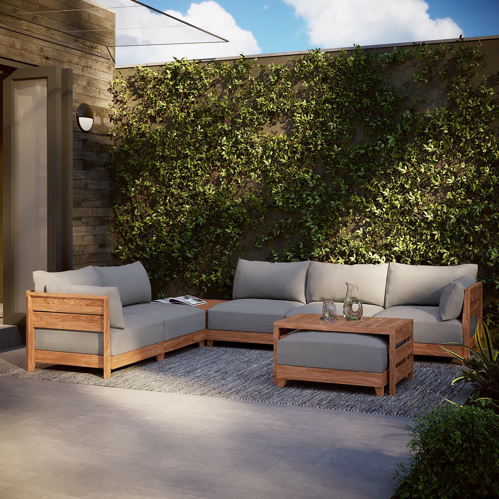 Dwell™ Modular Teak Outdoor 5-Seater L-Sectional with Ottoman + Side Table | Classic Canvas in Stone Gray